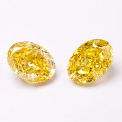 Natural Vivid Yellow Diamond Pair (0.51 cts & 0.52 cts)