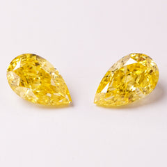 Natural Vivid Yellow Diamond Pair (0.50 cts & 0.52 cts)